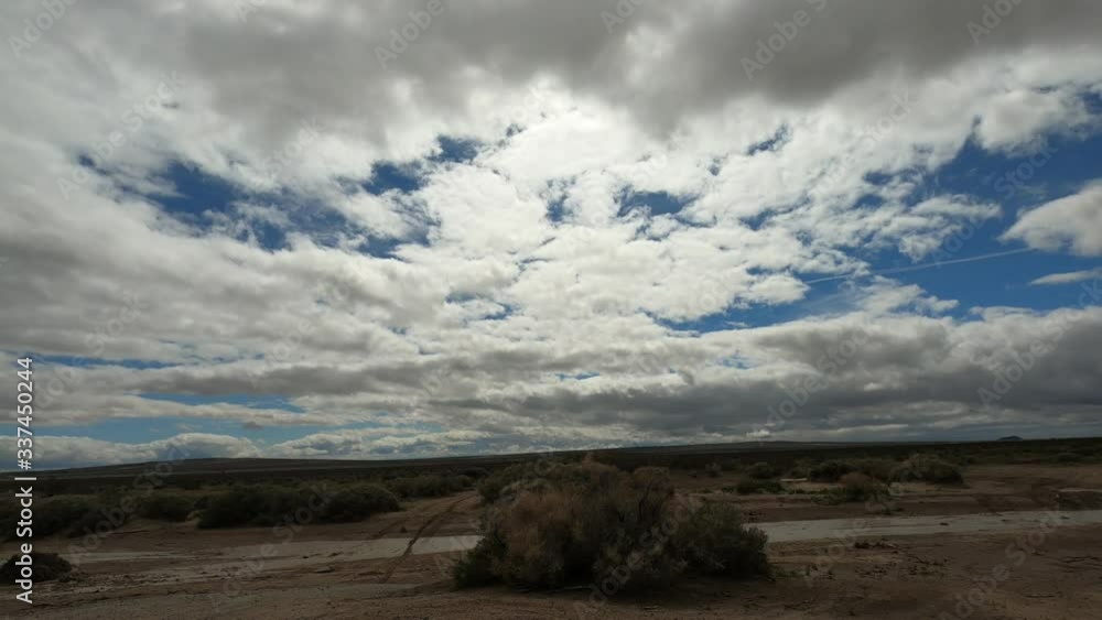 storm clouds over the mountains in the Mojave desert, time lapse