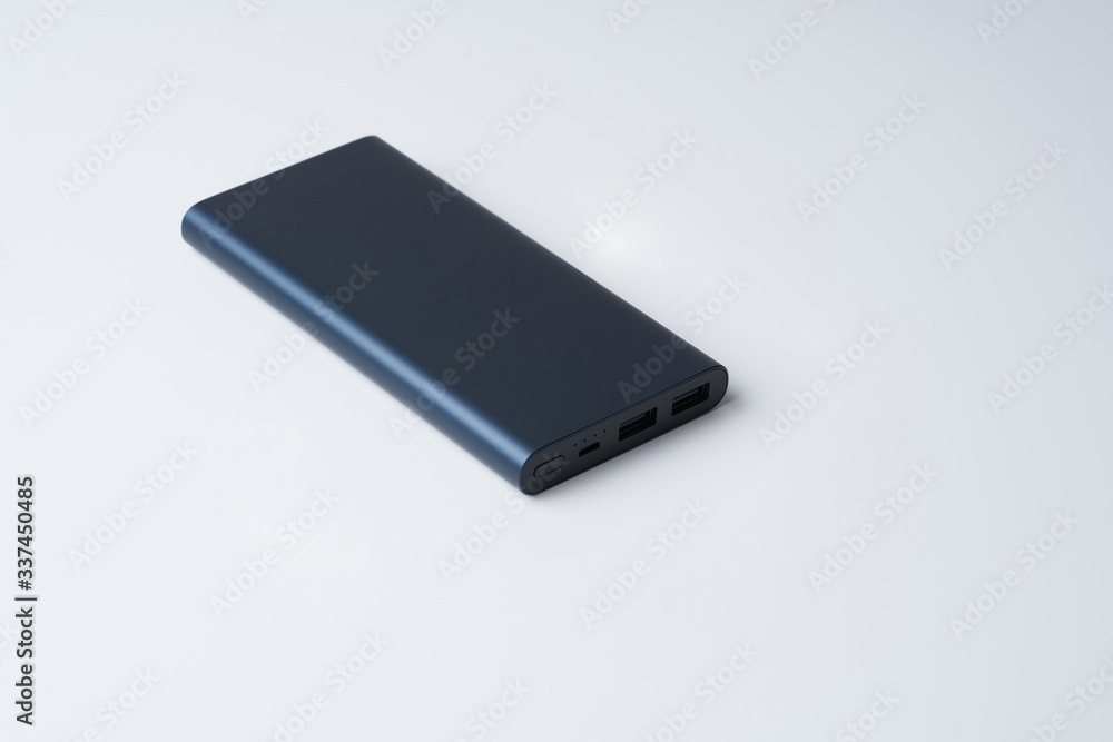 Blue power bank for divice isolated on a white background. Blue power bank for divice isolated on a white background.
