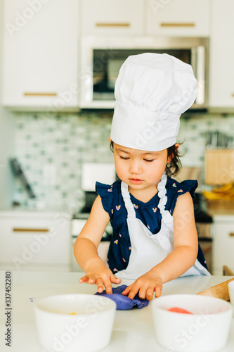 Toddler Girl Baking Cookies