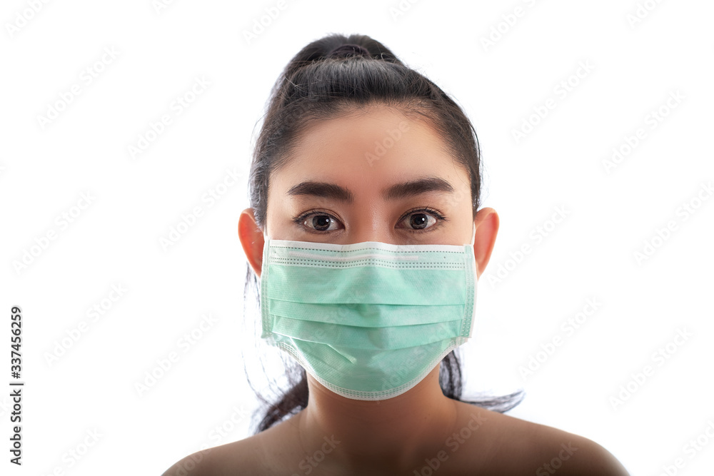 Beautiful young Asia woman putting on a medical mask to protect from airborne respiratory diseases as the flu covid-19 PM2.5 dust and smog, Women safety virus infection concept Beautiful young Asia woman putting on a medical mask to protect from airborne respiratory diseases as the flu covid-19 PM2.5 dust and smog, Women safety virus infection concept