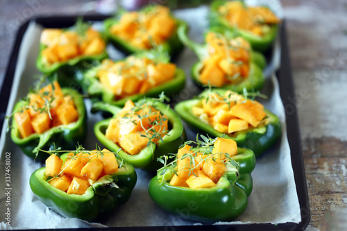 Green peppers stuffed with pumpkin. Vegan food. Healthly food. Cooking healthy food at home.