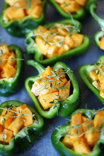 Green peppers stuffed with pumpkin. Vegan food. Healthly food. Cooking healthy food at home.