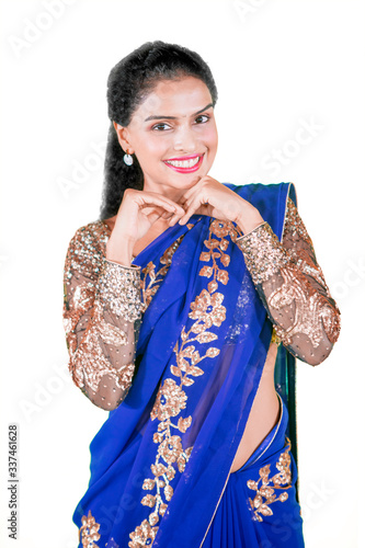 Woman looking at camera with saree clothes