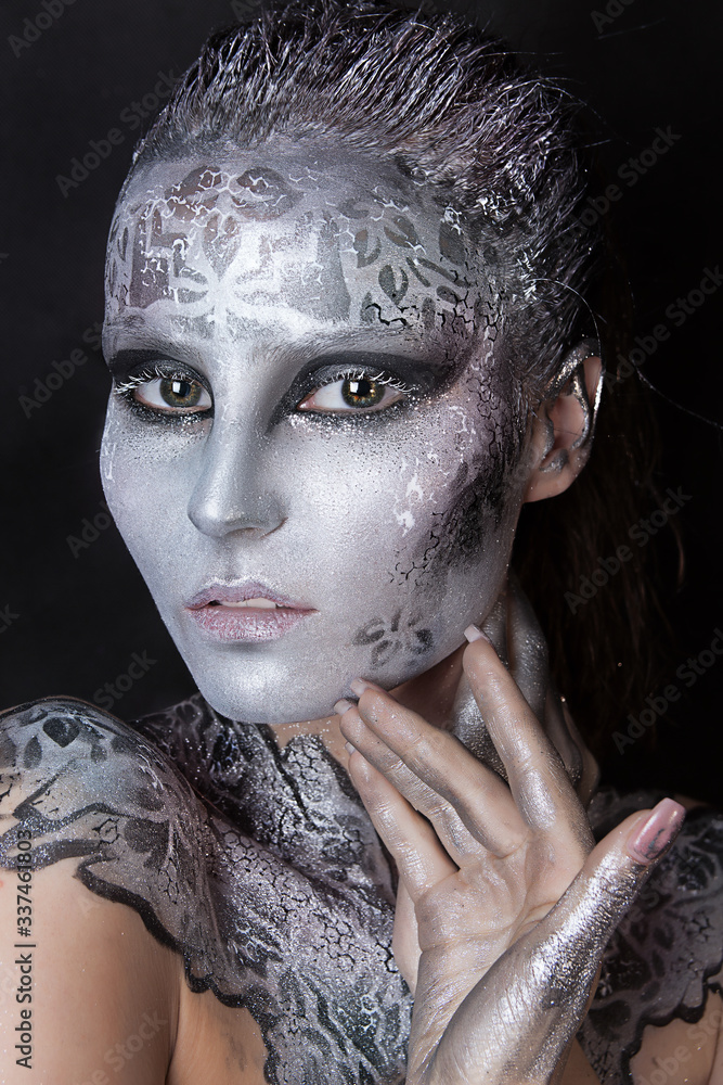 close up studio portrait of silver snow queen. Beauty professional Halloween makeup close up studio portrait of silver snow queen. Beauty professional Halloween makeup