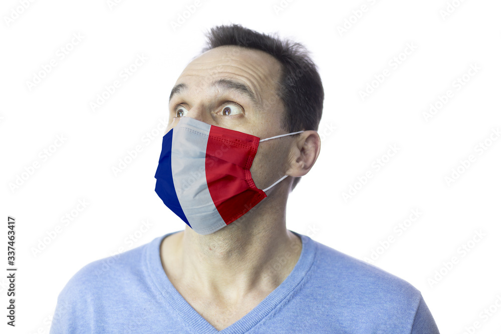 Portrait of scared man in protective medical mask against covid-19. Isolated studio. Coronavirus outbreak in Europe, fears of global pandemic. Virus epidemic infection 2019-nCov in France. Quarantine Portrait of scared man in protective medical mask against covid-19. Isolated studio. Coronavirus outbreak in Europe, fears of global pandemic. Virus epidemic infection 2019-nCov in France. Quarantine