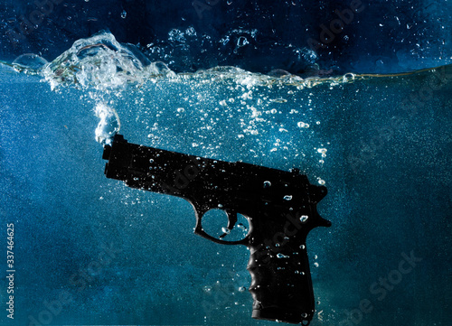 pistol in water photo