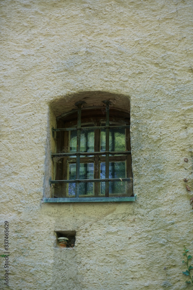 old window in a stone wall