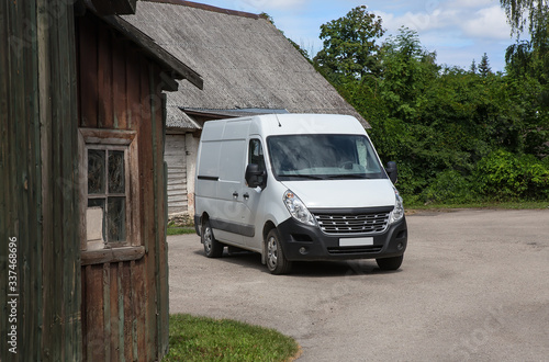 Minibus in the courtyard of a village