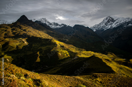 a beautiful mountain view with fog and clouds photo