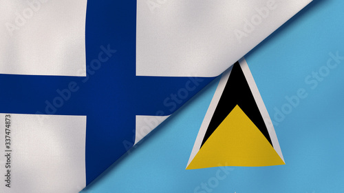 The flags of Finland and Saint Lucia. News, reportage, business background. 3d illustration photo