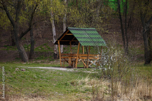 Wooden arbor on the nature on the lake