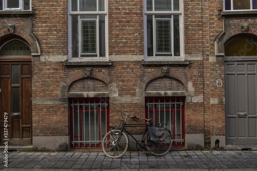 bicycle in front of a house © Leito
