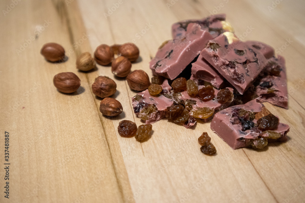 Pink Chocolate Chocolate with nuts, raisins and cranberries. Tasty. Pink Chocolate Chocolate with nuts, raisins and cranberries. Tasty.