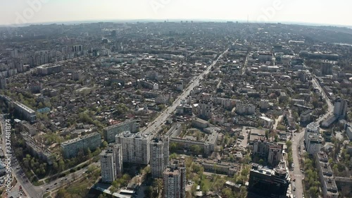 Establishing aerial shot over Chisinau, Moldova during daytime photo