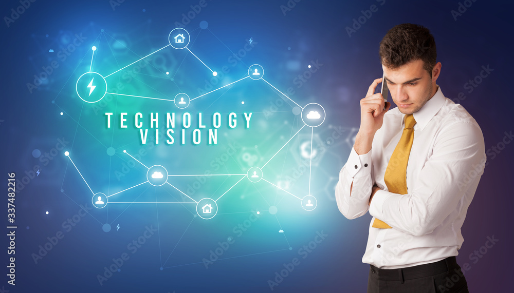 Businessman in front of cloud service icons with TECHNOLOGY VISION inscription, modern technology concept Businessman in front of cloud service icons with TECHNOLOGY VISION inscription, modern technology concept