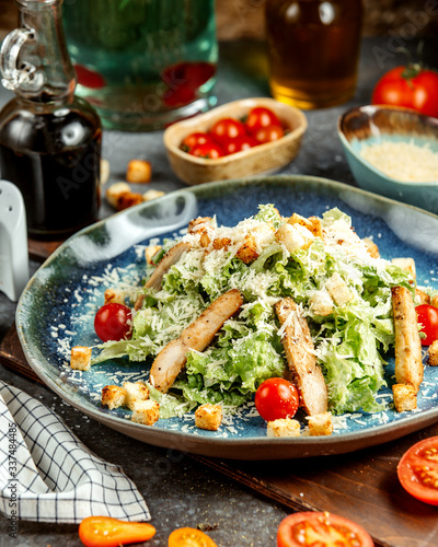 Photos caesar salad with fried chicken