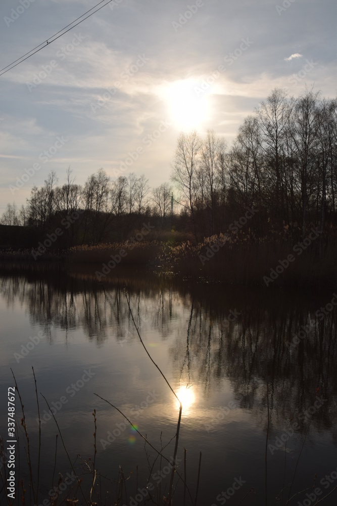 Obraz premium sun set over the lake