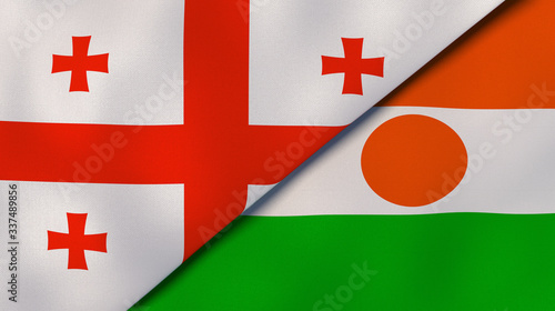 The flags of Georgia and Niger. News, reportage, business background. 3d illustration photo