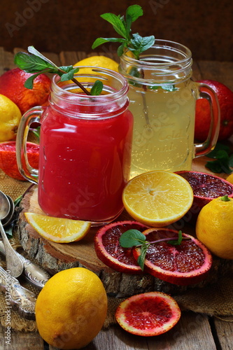 Lemon and orange fresh juice in glasses 