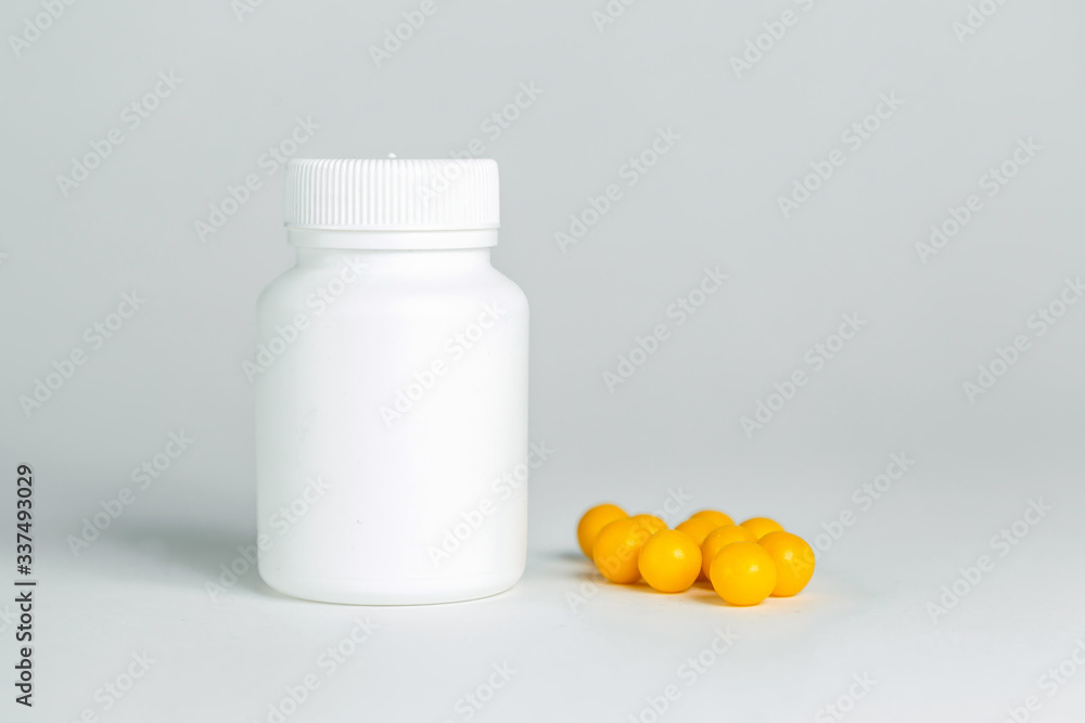 white plastic can with medicines white plastic can with medicines