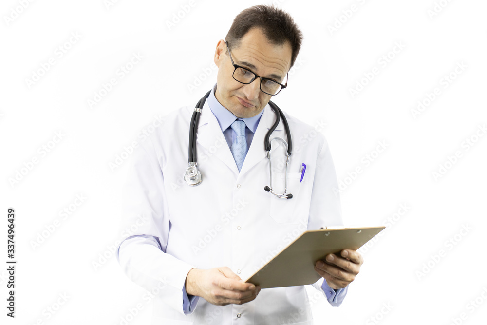 Surprised male doctor in white medical coat and stethoscope looking on clipboard with patient's medical diagnosis on isolated white background. Health, healthcare, insurance and medical concept Surprised male doctor in white medical coat and stethoscope looking on clipboard with patient's medical diagnosis on isolated white background. Health, healthcare, insurance and medical concept