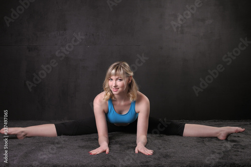 young flexible woman is training