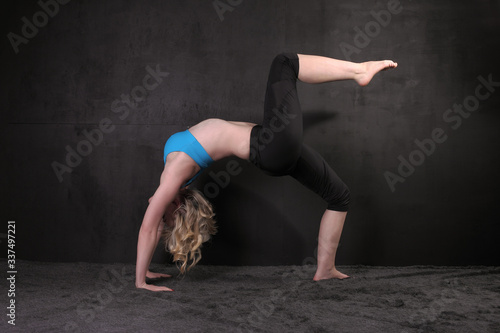 young flexible woman is training
