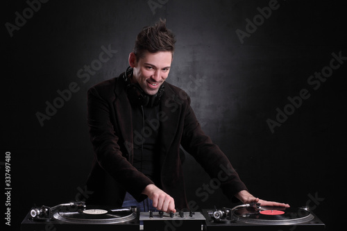 DJ playing music at mixer