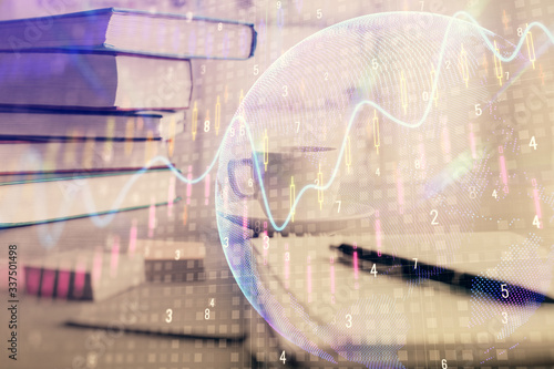 Double exposure of financial chart drawing and desktop with coffee and items on table background. Concept of forex market trading