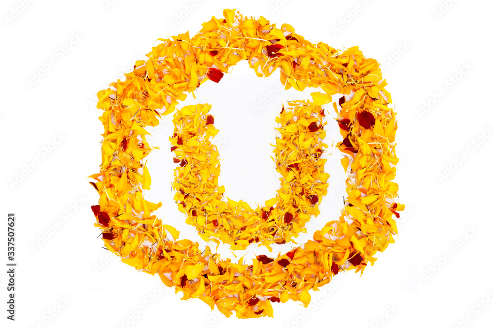 Letter U In Spring Flower Petal Hexagon. Marigold petal alphabet isolated on white background. Letter U In Spring Flower Petal Hexagon. Marigold petal alphabet isolated on white background.