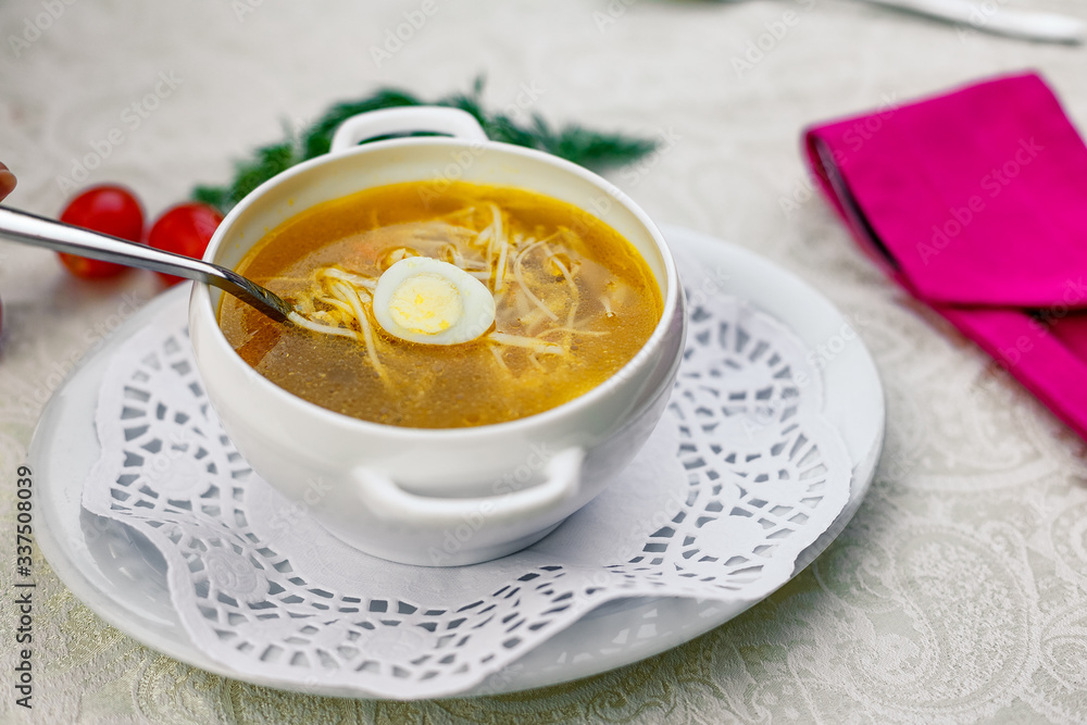 chicken soup with noodles and eggs with vegetables serving for lunch chicken soup with noodles and eggs with vegetables serving for lunch
