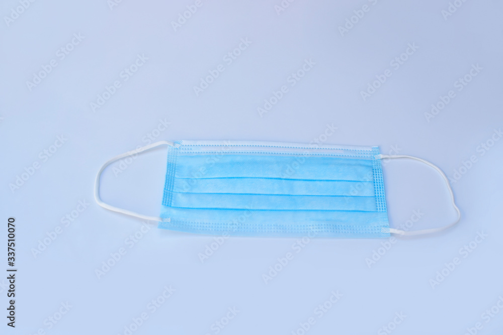 Soft focus of the mask on grey background. Healthy care concept and take care your body for protection from virus, bacteria and microbes. Soft focus of the mask on grey background. Healthy care concept and take care your body for protection from virus, bacteria and microbes.