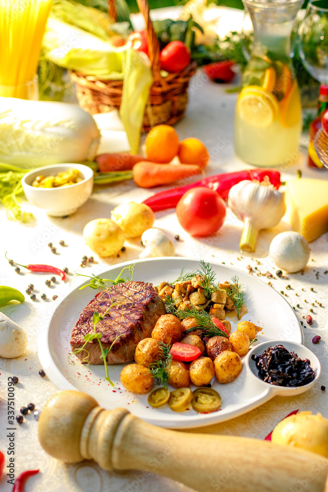 delicious steak with mushrooms and baked potatoes with jalapeno, healthy food delicious steak with mushrooms and baked potatoes with jalapeno, healthy food