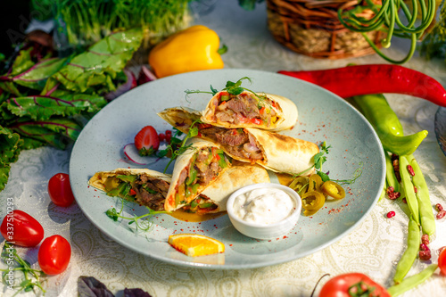Traditional Mexican Food - Burrito, on white wooden retro table