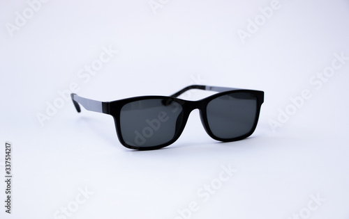 Black sunglasses with black and Violet plastic frame with polarized gradient isolated on white background