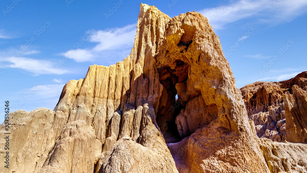 The dramatic and unique patterns of Slot Canyons and Hoodoos caused by erosion of the soft volcanic Bentonite Clay in Cathedral Gorge State Park in the Nevada Desert, United Sates