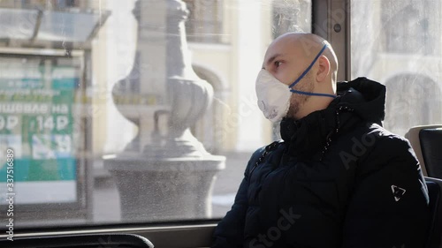 A young boy infected with a coronavirus rides a bus through a deserted city and feels ill