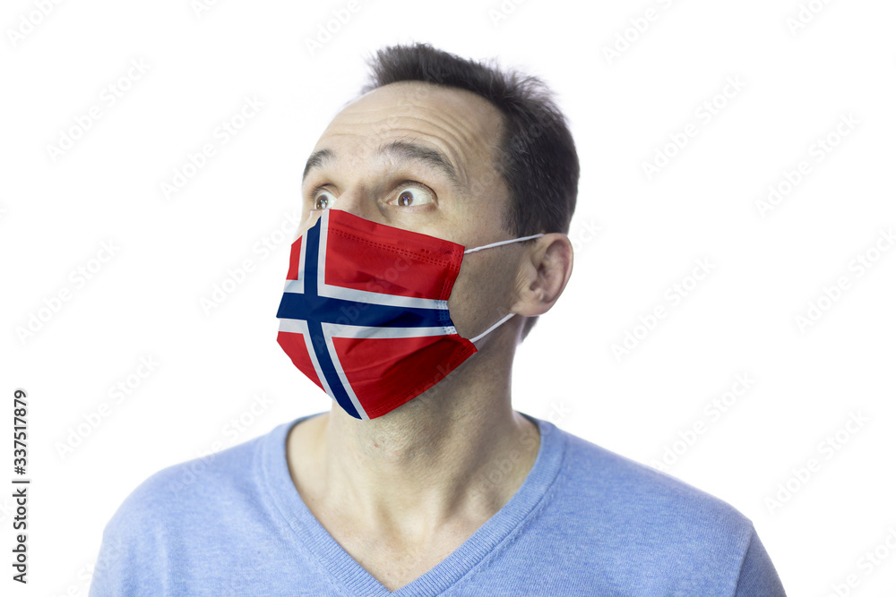 Portrait of scared man in protective medical mask against covid-19. Isolated studio. Coronavirus outbreak in Europe, fears of global pandemic. Virus epidemic infection 2019-nCov in Norway. Quarantine Portrait of scared man in protective medical mask against covid-19. Isolated studio. Coronavirus outbreak in Europe, fears of global pandemic. Virus epidemic infection 2019-nCov in Norway. Quarantine