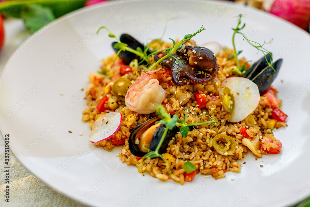 ice risotto with seafood, mussels, shrimps and vegetables, healthy food ice risotto with seafood, mussels, shrimps and vegetables, healthy food