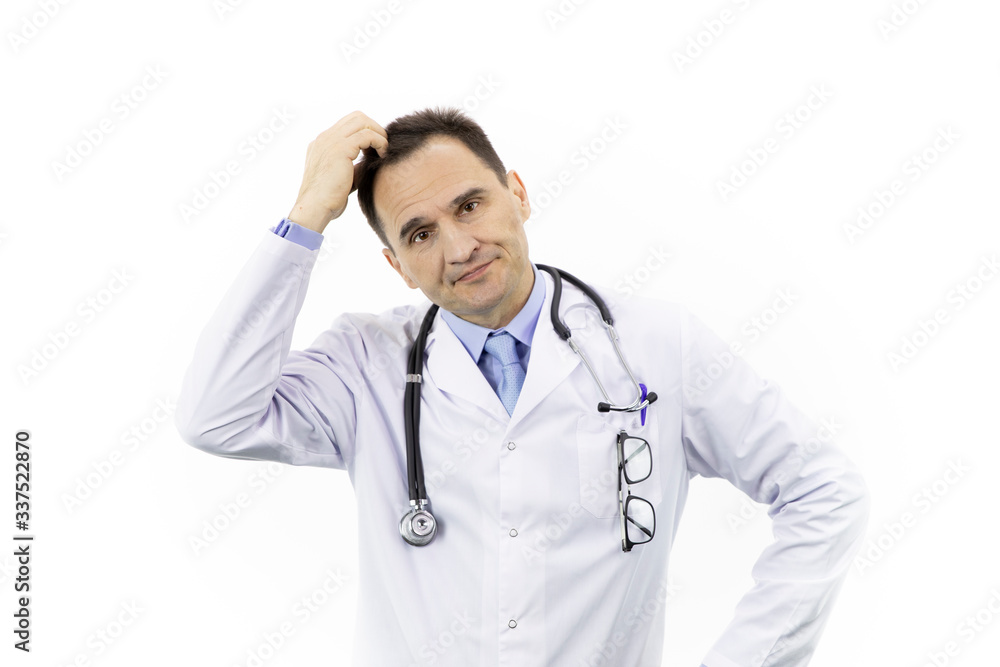 Middle-aged handsome doctor in white coat and stethoscope looking unhappy and frustrated scratches head with his hand, isolated white background, making decision concept Middle-aged handsome doctor in white coat and stethoscope looking unhappy and frustrated scratches head with his hand, isolated white background, making decision concept