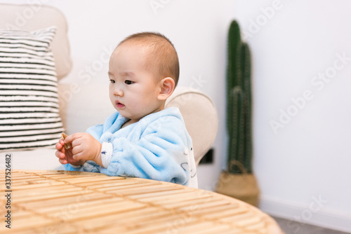 Asian baby living in the room