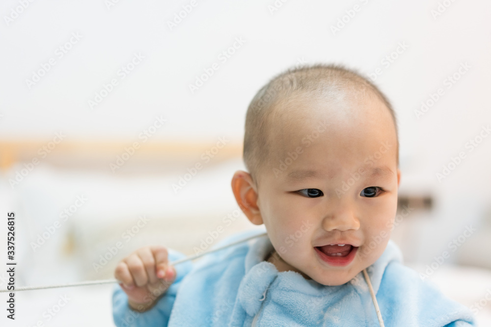 Asian baby living in the room