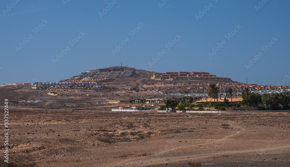 Buildings on the mountain in caleta de Fuste on Fuertaventura , Canary Island, Spain. October 2019