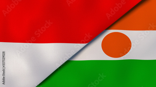 The flags of Indonesia and Niger. News  reportage  business background. 3d illustration