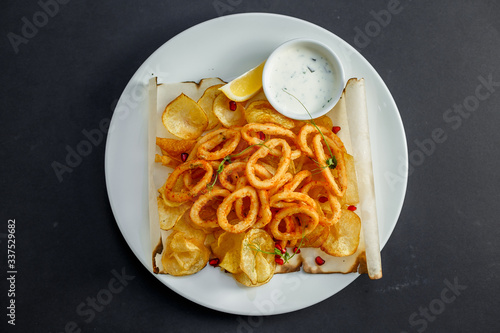 onion rings with chips and sauce