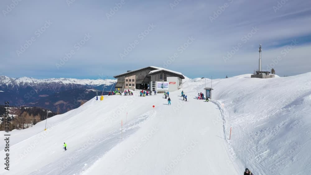 Aerial Landscape View of Nassfeld Ski Resort in Austrian province of Carinthia with Skiers on slopes Aerial Landscape View of Nassfeld Ski Resort in Austrian province of Carinthia with Skiers on slopes