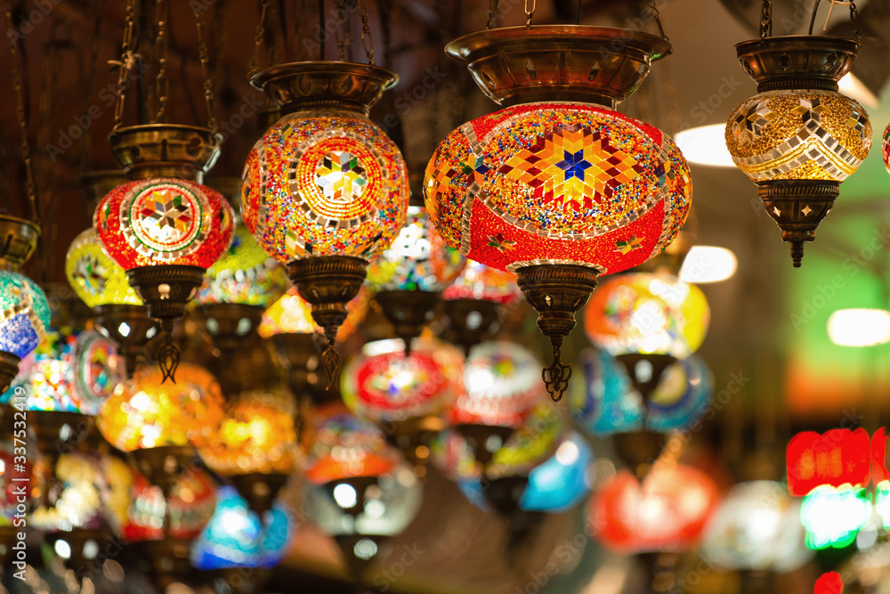 lighting with colors on muslim style's lantern shining. Colorful lamp. Ramadan background.