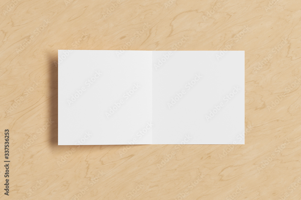 Blank square pages leaflet on wooden background. Bi-fold or half-fold opened brochure isolated with clipping path. View directly above. 3d illustration Blank square pages leaflet on wooden background. Bi-fold or half-fold opened brochure isolated with clipping path. View directly above. 3d illustration