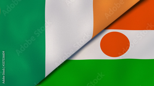 The flags of Ireland and Niger. News, reportage, business background. 3d illustration