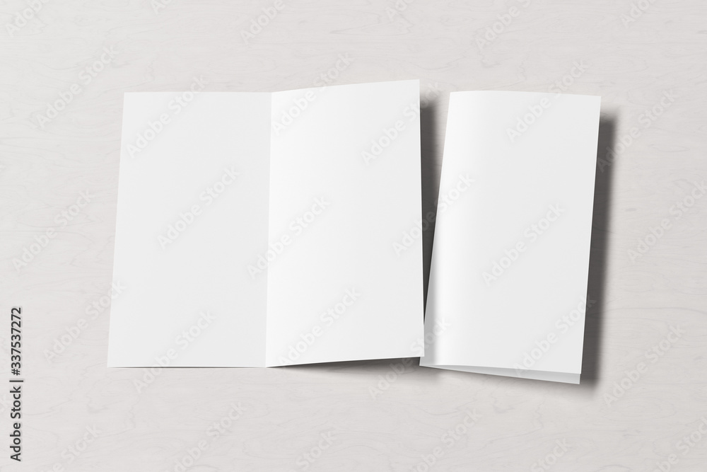 Blank square leaflet on white wooden background. Bi-fold or half-fold opened and folded brochure isolated with clipping path. Side view. 3d illustration Blank square leaflet on white wooden background. Bi-fold or half-fold opened and folded brochure isolated with clipping path. Side view. 3d illustration